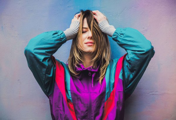 How can you dress stylishly for rainy weather?